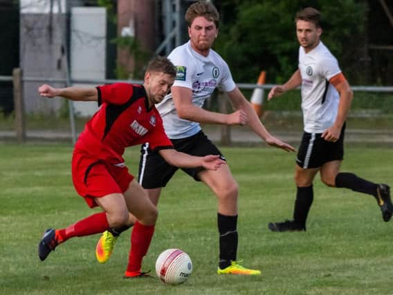Phil Johnson in pre-season action against Burgess Hill Town. Picture by Chris Neal