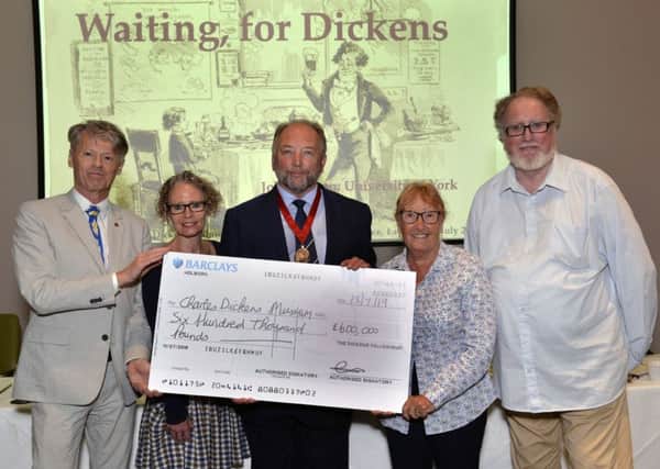 Dickens Fellowship 100th anniversary and cheque presentation. L-R,John Bowen, Cindy Sughrue, Ian Dickens, Maggie de Vos and Tony Williams (Photo by Jon Rigby) SUS-190729-100508008