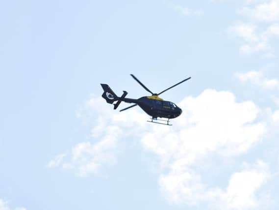 The police helicopter over Eastbourne