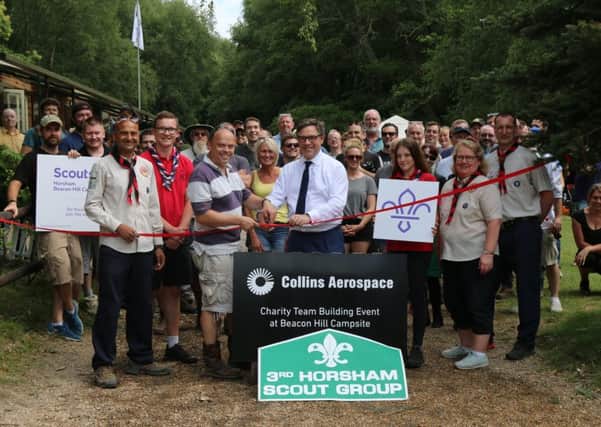 Grand re-opening of the refurbished and renovated Beacon Hill Campsite by MP Jeremy Quin with employees from Collins Aerospace, and 3rd Horsham Scout Group SUS-190730-091015001
