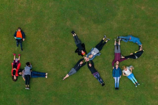 Brighton Yoga Foundation joined forces with Extinction Rebellion Brighton on Saturday (July 27) in a visual act of solidarity. Photograph: James Beer, 23 Digital