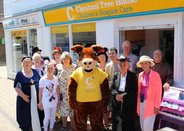 Sue Jameson (far right) together with staff and volunteers outside the Chestnut Tree House children's hospice Billingshurst shop SUS-190730-164047001