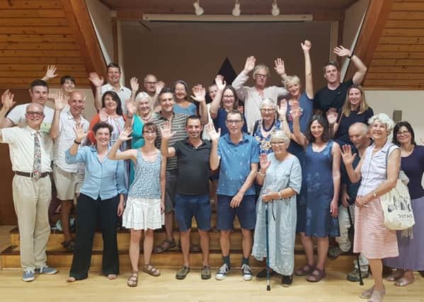 Johnny Denis, front centre in the black polo shirt, has been reselected as the Green Party's prospective parliamentary candidate for Lewes