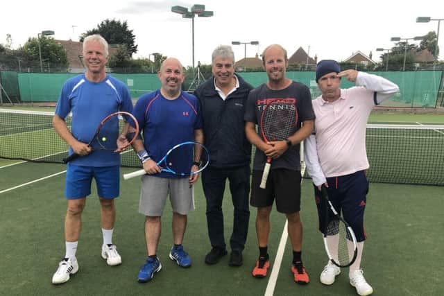 Broadcaster John Inverdale umpired a doubles match for head coach Andrew Cook and the three players who made the highest sealed bids to take part