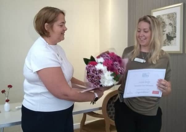 Louise Smith from Red Oaks care home in Henfield receiving her Dementia Care Champion award for Barchesters South Division in the Barchester Care Awards 2019 SUS-190731-122453001