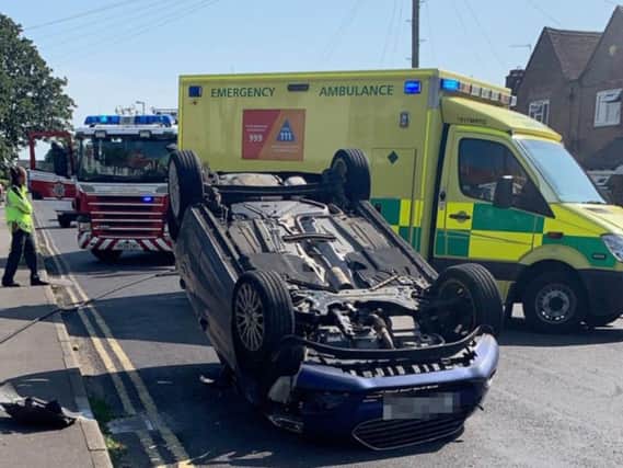 A car has rolled over in Shoreham