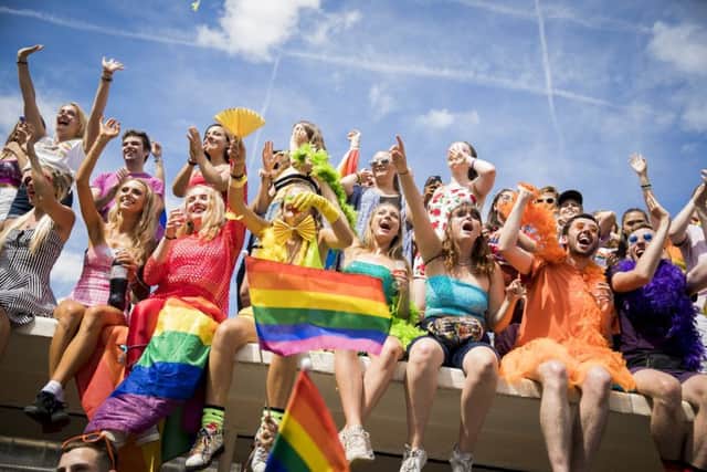 Crowds watch the parade during Brighton Pride 2018 on August 4, 2018.  (Photo by Tristan Fewings/Getty Images) SUS-190731-170439001