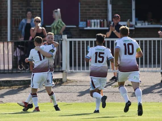 Hastings United celebrate in their preliminary round tie with Broadbridge Heath. Picture by Scott White.