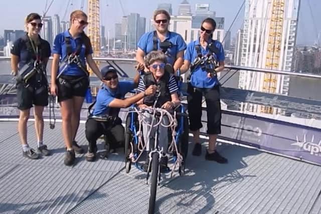 Shirley McCall at the top of the O2 with staff
