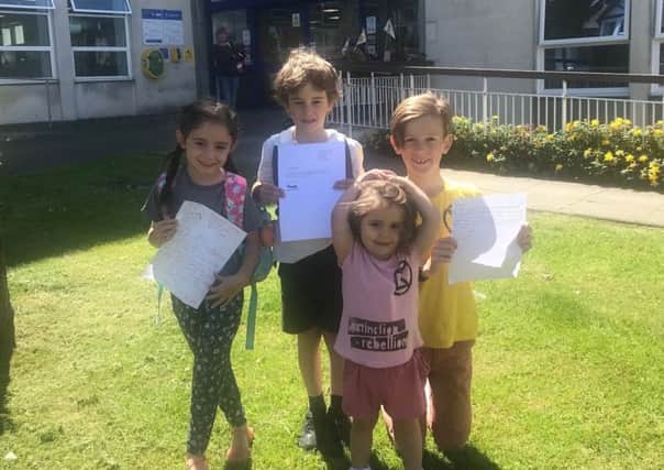 Children protesting against weedkillers outside Eastbourne council