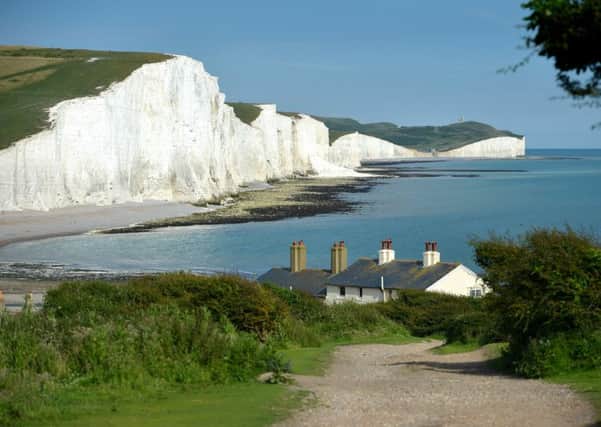 The Seven Sisters coastguard cottages are under risk of being destroyed by the sea. Photo by Peter Cripps