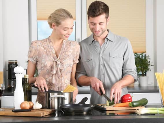 Woman and man cooking