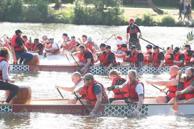 Dragon boat teams battle it out on the lake at Tilgate Park