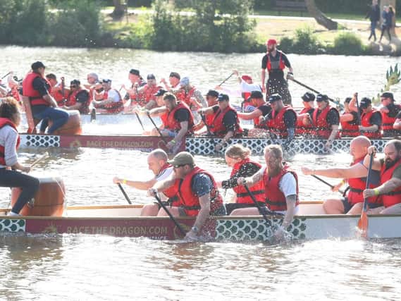 Dragon boat teams battle it out on the lake at Tilgate Park