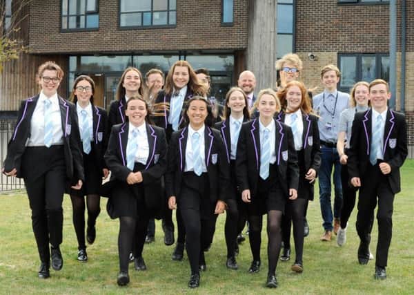 ks190512-7 Litt Academy Ofsted  phot kate
Morgan Thomas, headteacher of Littlehampton Academy, back centre right, and pupils delighted with their Ofsted report.ks190512-7 SUS-190916-213213008