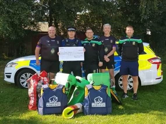 (Left to right) PCSO Neil Billingham, Rob Outen, Jason Cobalt and Tom Spurle. Photo: Sussex Police