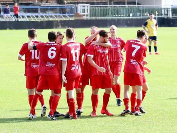 Hassocks celebrate their goal at Eastbourne Town on Saturday. Picture by Joe Knight