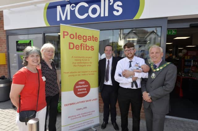 Polegate Defibrillator Group with council officials (Photo by Jon Rigby)