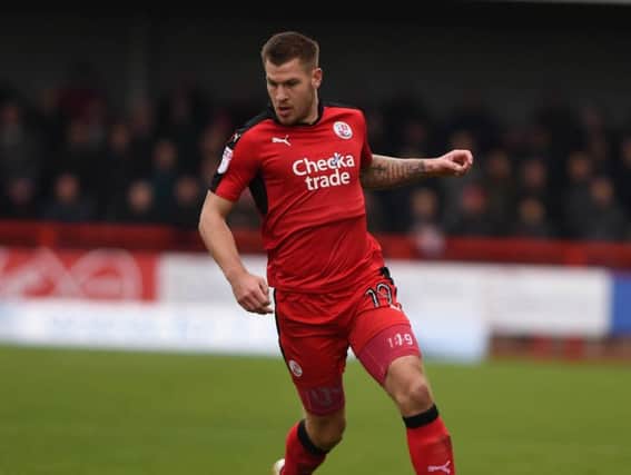 James Collins in action for Crawley Twon. Picture by PWW Sporting Photography