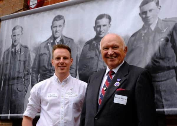 Adam Tudor-Lane, convenor of event (left), with Gp Capt DE North DL RAF (Retd) in front of crew of FR396 SUS-191109-130610001