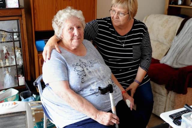 Arun District Council confirmed that Hazel, left, would be able to keep the scooter in the flat, if she obtained satisfactory insurance. Photo: Kate Shemilt