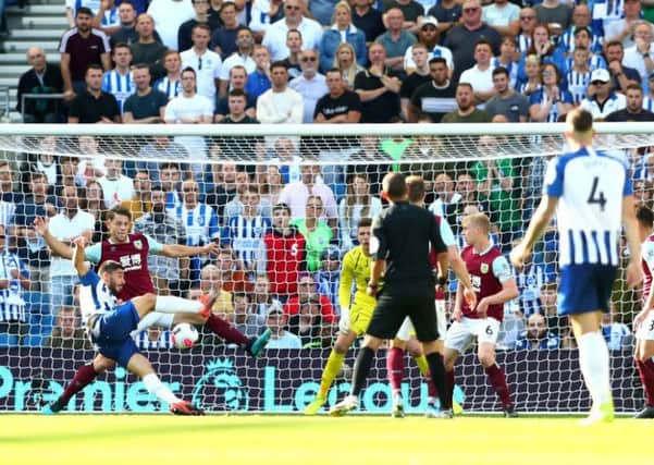 BRIGHTON, ENGLAND - SEPTEMBER 14: Neal Maupay of Brighton and Hove Albion scores his team's first goal during the Premier League match between Brighton & Hove Albion and Burnley FC at American Express Community Stadium on September 14, 2019 in Brighton, United Kingdom. (Photo by Dan Istitene/Getty Images) SUS-190915-141055002