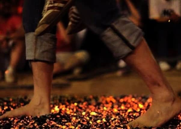 Walking over hot coals