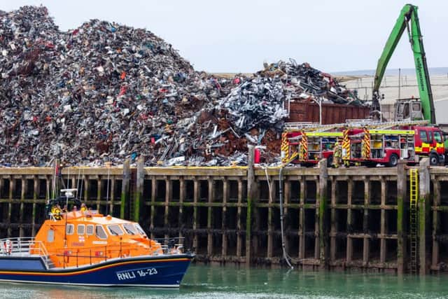 The Eastbourne lifeboat assisting firefighters at a scrapyard blaze in Newhaven, photo by Pete Abel