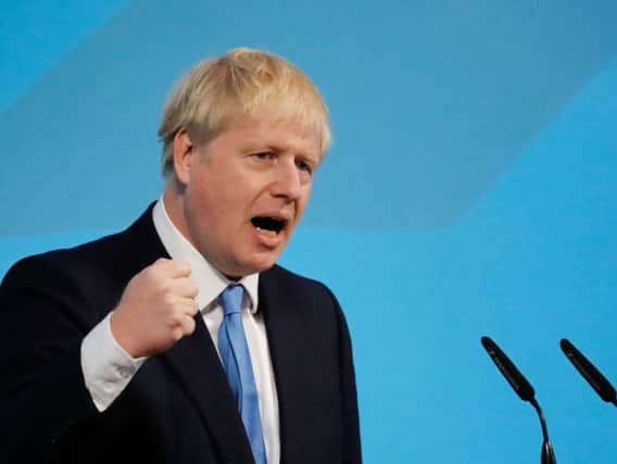 Prime minister Boris Johnson gives a speech at an event to announce the winner of the Conservative Party leadership contest in central London on July 23, 2019. (Photo by Tolga AKMEN / AFP)