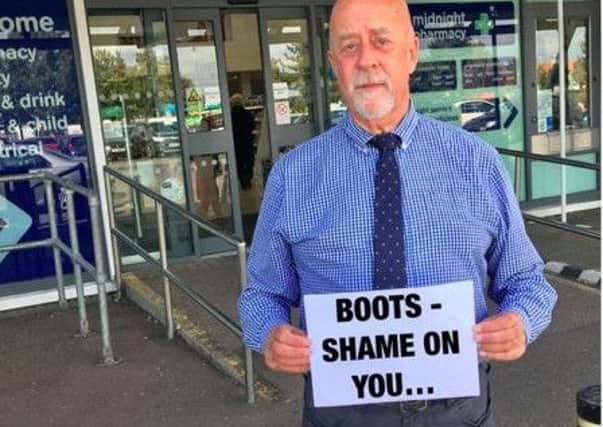 Cllr Robin Maxted outside Eastbourne Boots