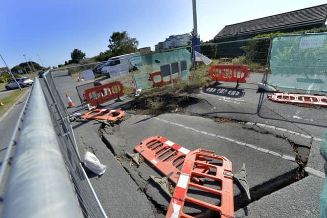 Sink hole in Wartling Road, Eastbourne (Photo by Jon Rigby) SUS-190919-105409008
