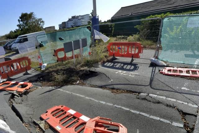 Sink hole in Wartling Road, Eastbourne (Photo by Jon Rigby) SUS-190919-105432008