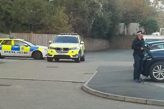 Armed police in Lovat Mead, St Leonards