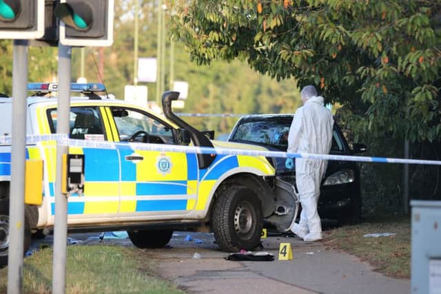Forensic investigators at the scene in Littlehampton this morning