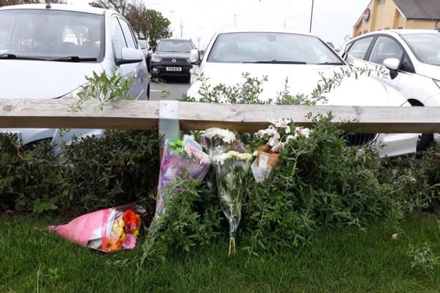 Flowers have been laid in Belmont Street today (Monday). Photo: Kate Shemilt