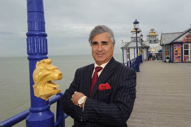 Mr Gulzar on Eastbourne Pier (Photo by Jon Rigby) SUS-160408-083637008