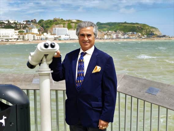 Sheikh Abid Gulzar pictured on Hastings Pier. Photo by Sid Saunders SUS-180619-165701001