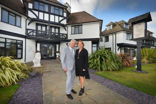 James and Lesley Kimber pictured outside The Cooden Beach Hotel