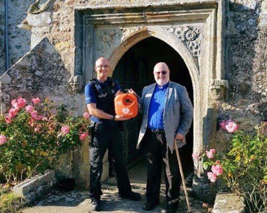 Left to right: PCSO Daryl Holter with the Rev Paul Frostick. Picture courtesy of Sussex Police SUS-190924-162624001