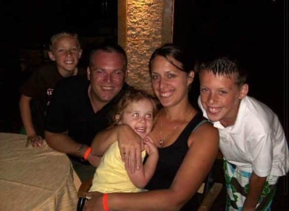 Ryan with wife Claire and their two children
