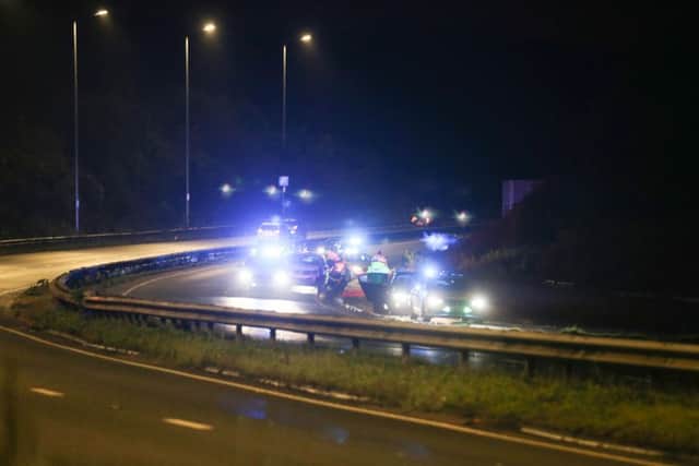 A police officer was seriously injured when he was hit by a passing car on the A27