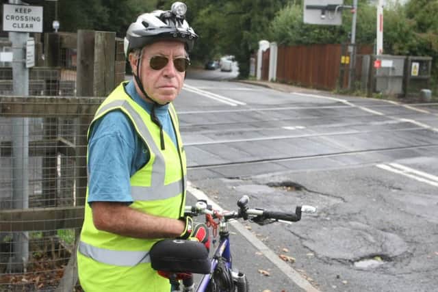 Graham Sitton is concerned about a large pothole on the level crossing at Littlehaven Railway Station
