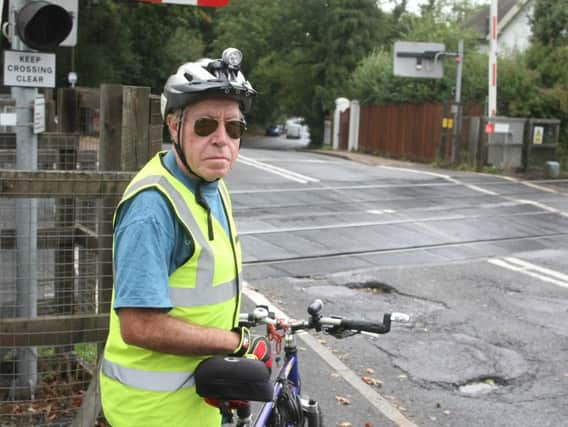 Graham Sitton is concerned about a large pothole on the level crossing at Littlehaven Railway Station