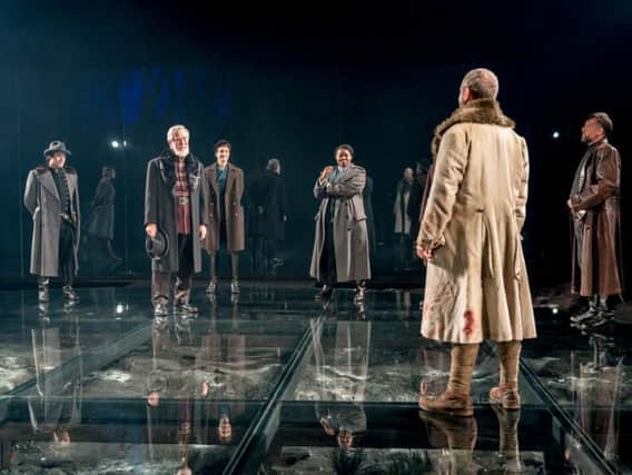 Macbeth on its glass stage - photo by Manuel Harlan