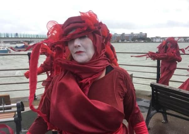 Red Rebel Activist in Shoreham. Photo by John Reeves