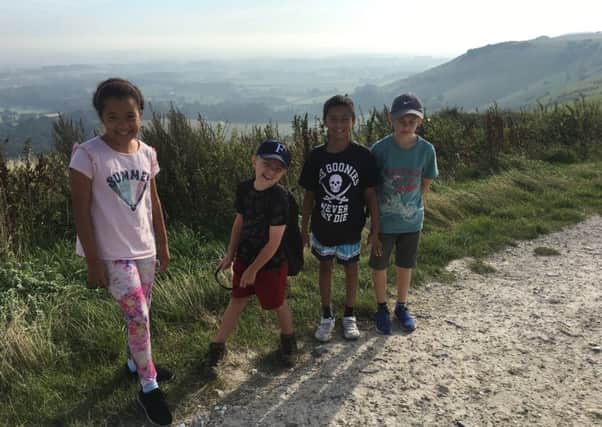 The four children walked from Ditchling Beacon to Devils Dyke as part of the fundraising trek
