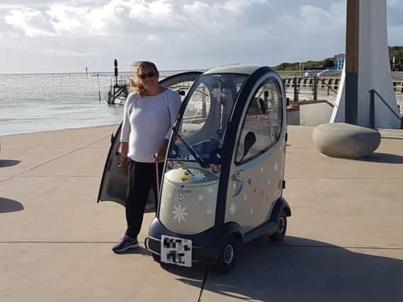 Tara Roberts out in Littlehampton with her mobility scooter