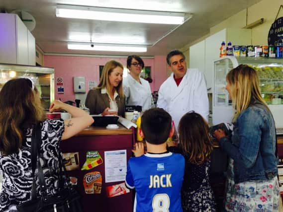 Customers line up at the Portslade Community Cafe