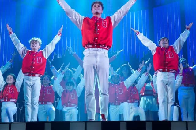 Right to left: Jobe Hart (Billy), Jay McGuiness (Josh Baskin), Jamie O'Connor (Young Josh) at the cast during Curtain Call  of BIG The Musical. Picture: Piers Allardyce