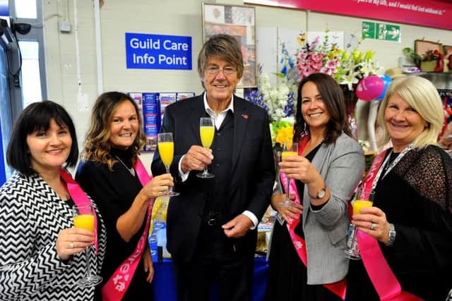 TV and radio presenter Mike Read with Guild Care staff and volunteers. Picture: Steve Robards SR03101901